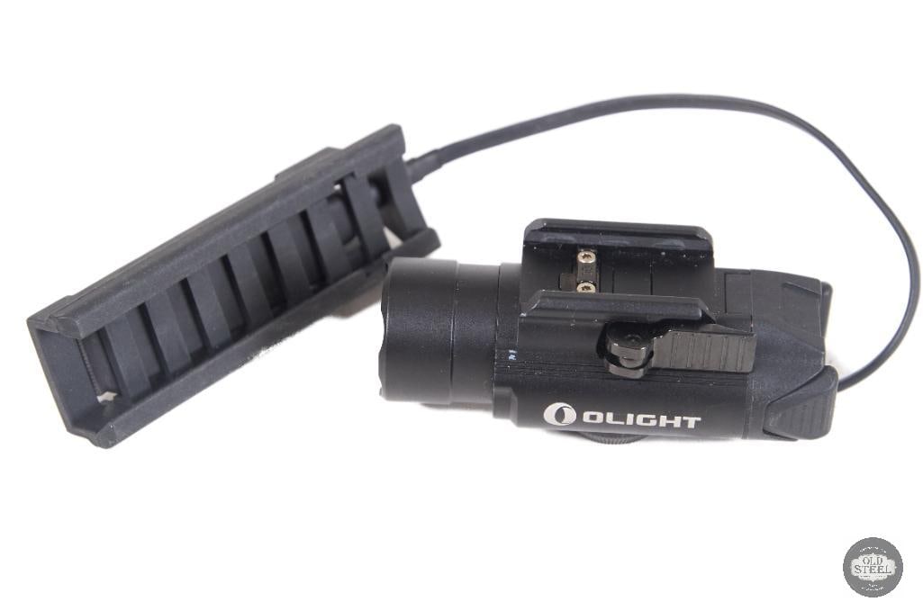 Olight PL-Pro Valkyrie Weapon Light Pistol Rail Light with Pressure Pad: This Olight PL-Pro Valkyrie is a compact, high-output weapon-mounted light designed for pistol rail systems. Built for fast target identification in low-light environments, it delivers a bright white 