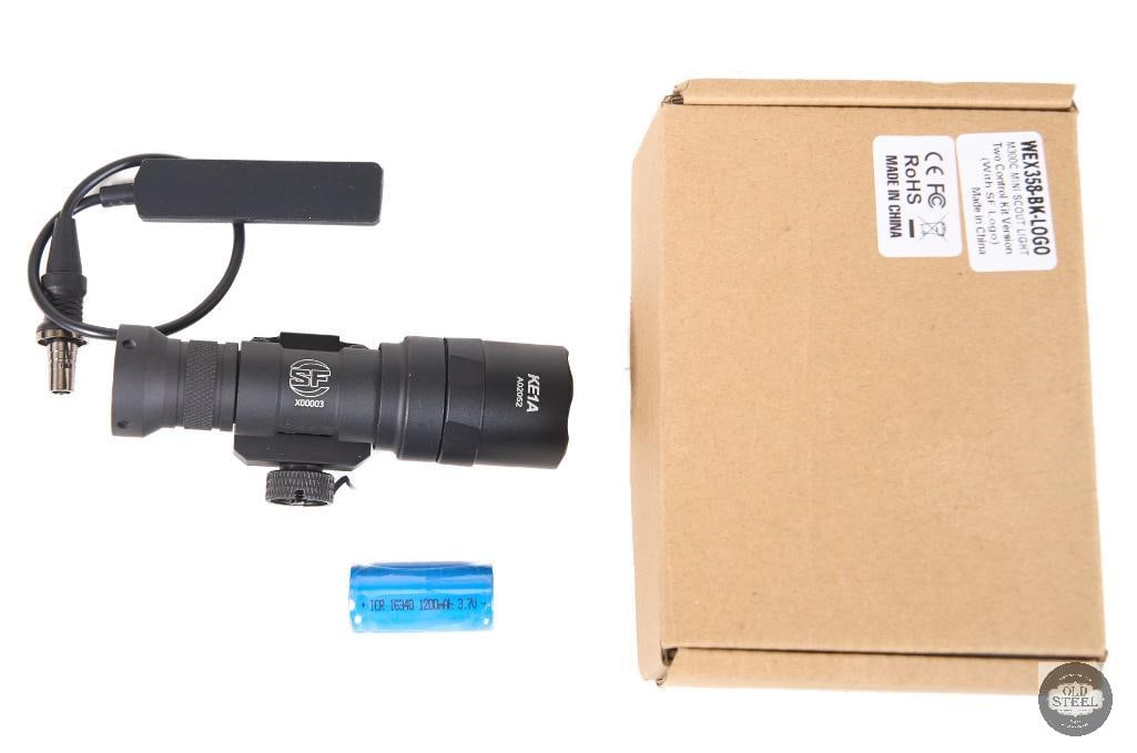 SureFire Scout-Style Weapon Light Rail Mounted Flashlight with Pressure Pad: This SureFire Scout-style weapon light is a compact, rail-mounted illumination system designed for Picatinny-equipped rifles and carbines. Built in the familiar low-profile Scout configuration, it