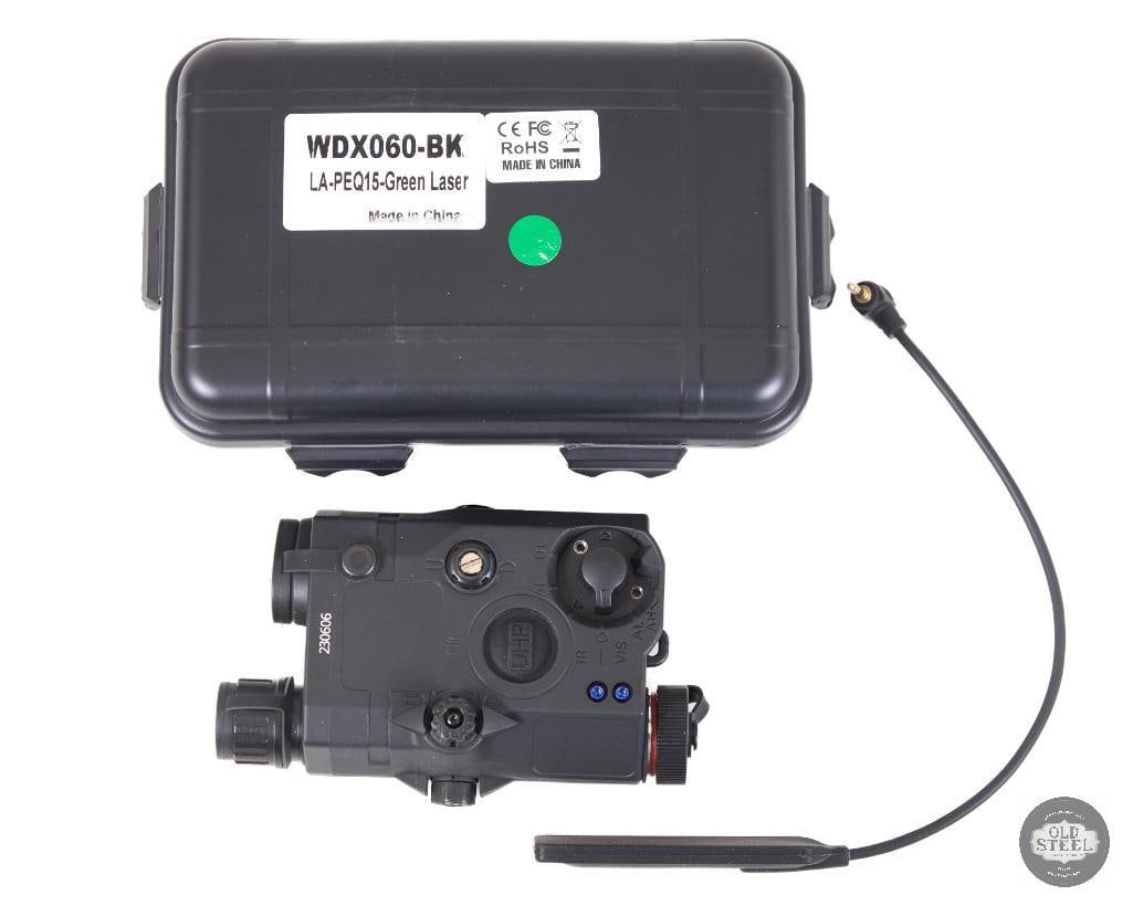 PEQ-15 Style Tactical Laser Module Black with Pressure Pad: This PEQ-15 style laser aiming module is a compact rail-mounted unit designed in the form factor of the widely recognized military-style aiming device. Finished in black, it mounts to standard Picatin