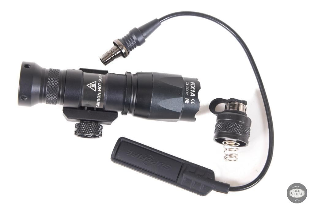 SureFire Scout-Style Weapon Light Rail Mounted Flashlight with Pressure Pad: This SureFire Scout-style weapon light is a compact, rail-mounted illumination system designed for Picatinny-equipped rifles and carbines. Built in the familiar low-profile Scout configuration, it