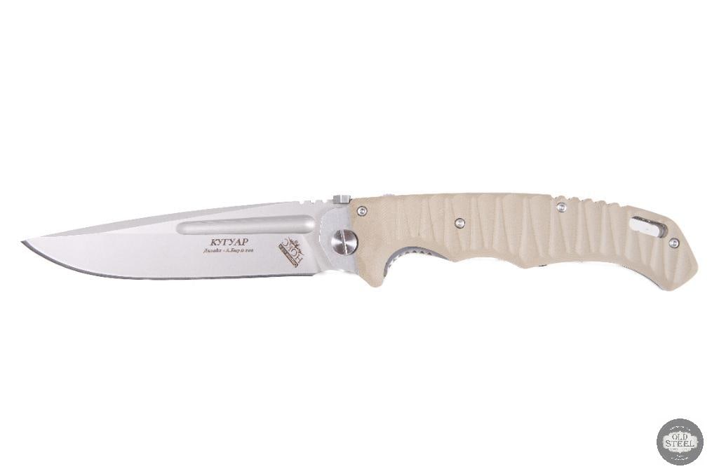 Large Russian-Marked Folding Knife 5" Blade, Sculpted Tan G10 Handle: This large folding knife features Russian markings on the blade and a substantial 5-inch cutting edge designed for utility and field use. Built with a sculpted tan G10 handle, it provides a secure,
