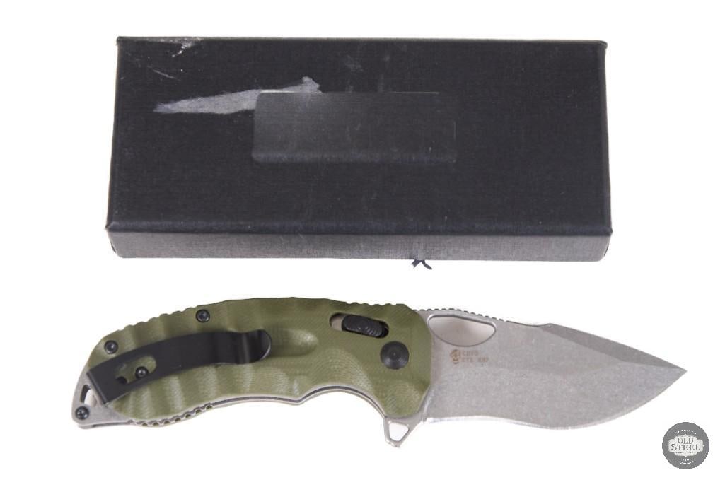 Green Sculpted G10 Flipper Knife with Box: This folding knife features a sculpted green G10 handle and a smooth flipper-style opening mechanism, combining practical everyday utility with an attractive, ergonomic design. The textured G10