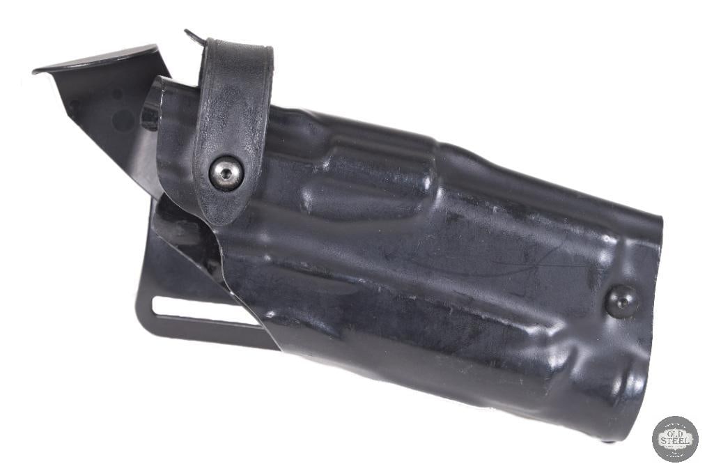 Safariland Level III Retention Holster Black, for SIG P320 w/ M3 Light & UBL Mid-Ride: This Safariland Level III retention holster is designed for the SIG P320 equipped with an M3 weapon light, providing a secure and duty-proven carry solution. Built with Safarilands proven retention sy