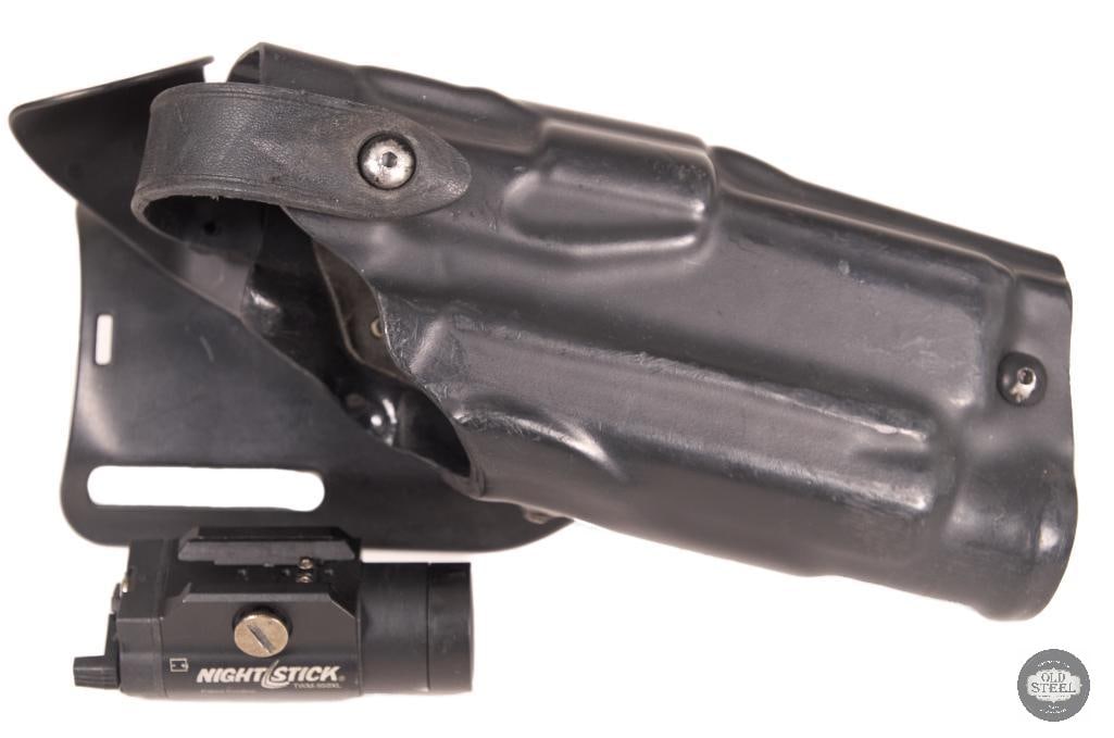 Safariland Level 3 P320 Holster w/ M3 Light, UBL Mid-Ride & Nightstick Light: This Safariland Level 3 retention holster is designed for the Sig Sauer P320 equipped with an M3-style weapon light, providing a secure and duty-ready carry solution with multiple levels of retention 