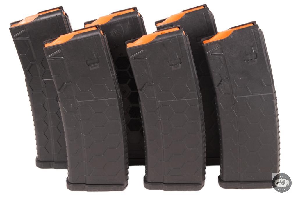Lot of 6 Hexmag AR-15 Magazines 15 Round Capacity: This lot includes six Hexmag AR-15 magazines with 15/30 round capacity configuration, designed for use with standard AR-15 platforms chambered in 5.56/.223. Known for their lightweight polymer