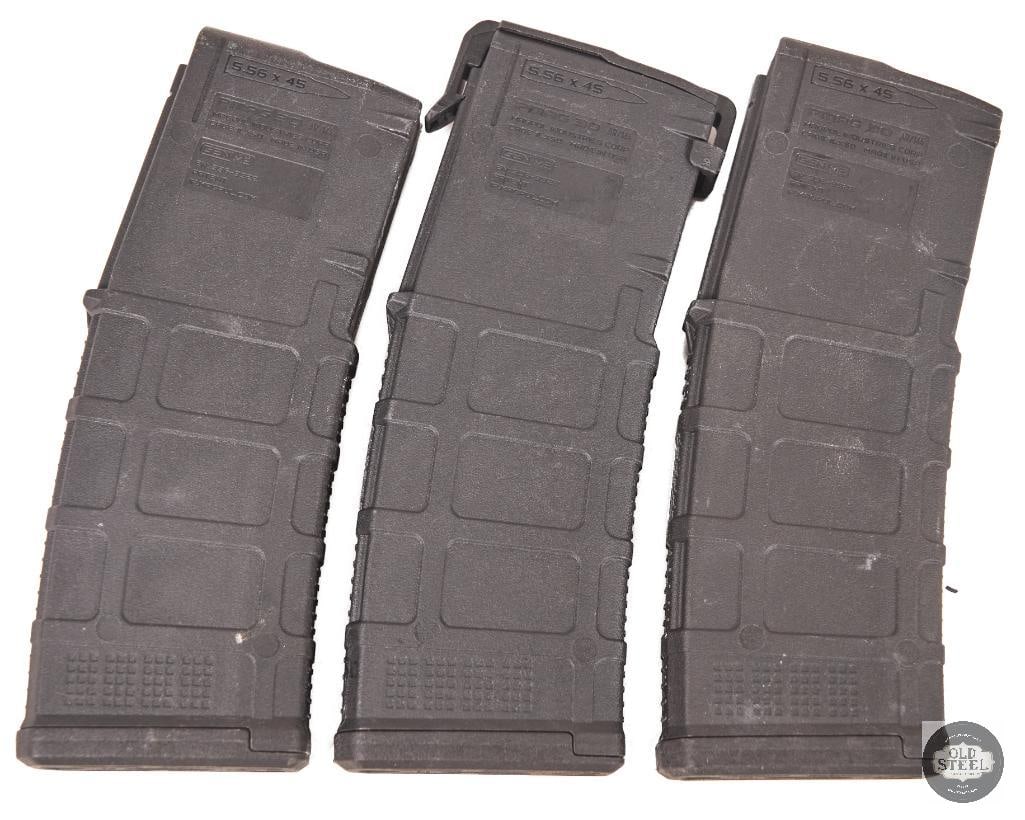 Lot of 3 Magpul PMAG 30-Round Magazines Black AR-15 Magazines: This lot includes three Magpul PMAG 30-round magazines in black, designed for AR-15 platform rifles chambered in 5.56/.223. Built from durable polymer construction, PMAGs are known for their reliabili