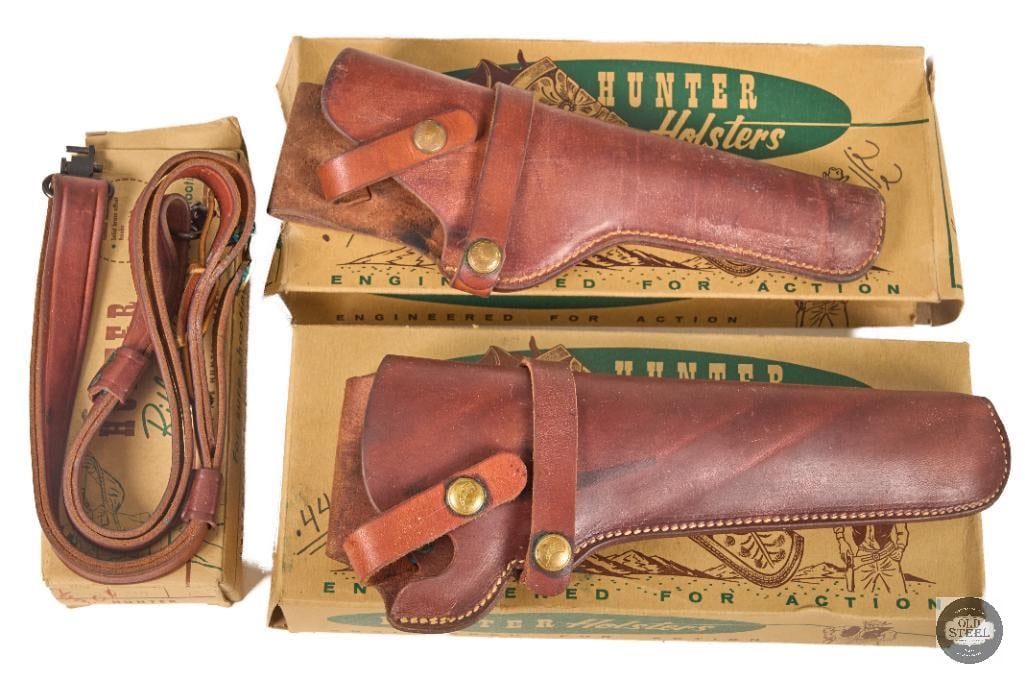 Lot of 2 Vintage Hunter Leather Holsters & Hunter Leather Rifle Sling: This lot includes two vintage Hunter brand leather holsters along with a matching Hunter brand leather rifle sling. Crafted from quality leather and built for years of field use, these classic