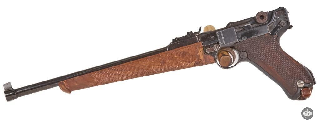DWM Luger Artillery 30 Luger C&R 12" Barrel Ladder Sight Mfg 1917: This DWM Luger Artillery model was manufactured in 1917 and features the distinctive 12-inch barrel, adjustable ladder rear sight, and checkered wood handguard that define one of the most