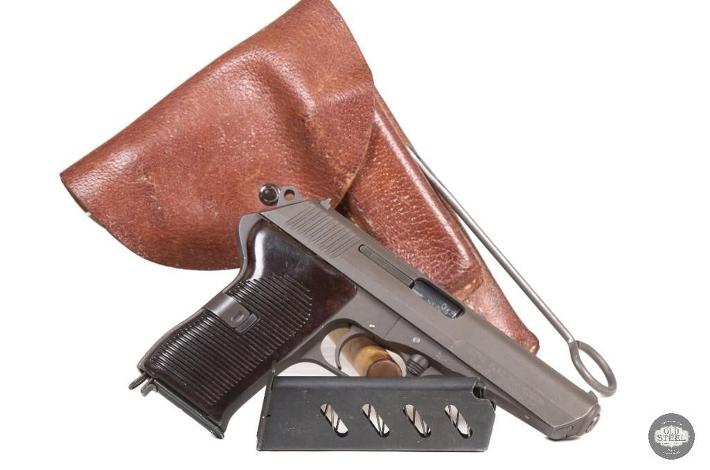CZ 52 C&R Mfg 1954 7.62x25 Tokarev w/ Mag Holster & Rod: This CZ 52 pistol was manufactured in 1954 and is chambered in 7.62x25 Tokarev, featuring the distinctive roller-locked design known for its strong construction and military service history. The