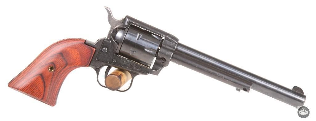Heritage Rough Rider .22 LR 6.5" Barrel Red Laminate Grips: This Heritage Rough Rider is chambered in .22 LR and features a 6.5-inch barrel along with attractive red laminate grip panels that give the revolver a distinctive appearance. Styled after classic