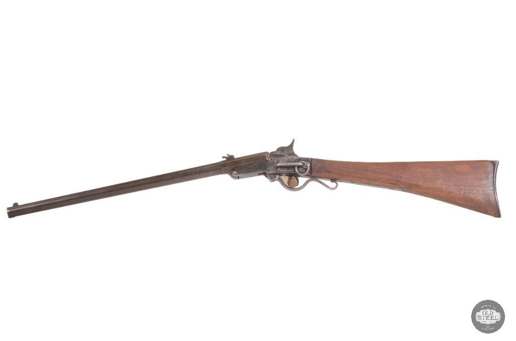 Maynard Breech Loading Saddle Ring Carbine .50 Cal Antique 20" Barrel: This Maynard breech loading saddle ring carbine is chambered in .50 caliber black powder and features a 20-inch barrel with a 14.5-inch length of pull. The carbine retains its saddle ring and is in