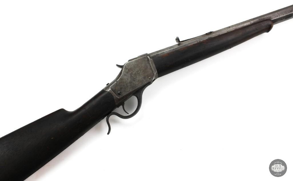 Antique Winchester 1885 High Wall .40-70 Ballard MFG 1890 Octagon Barrel: This antique Winchester Model 1885 High Wall was manufactured in 1890 and is chambered in .40-70 Ballard. It features a 30-inch octagon barrel with a 13-inch length of pull. The rifle is in