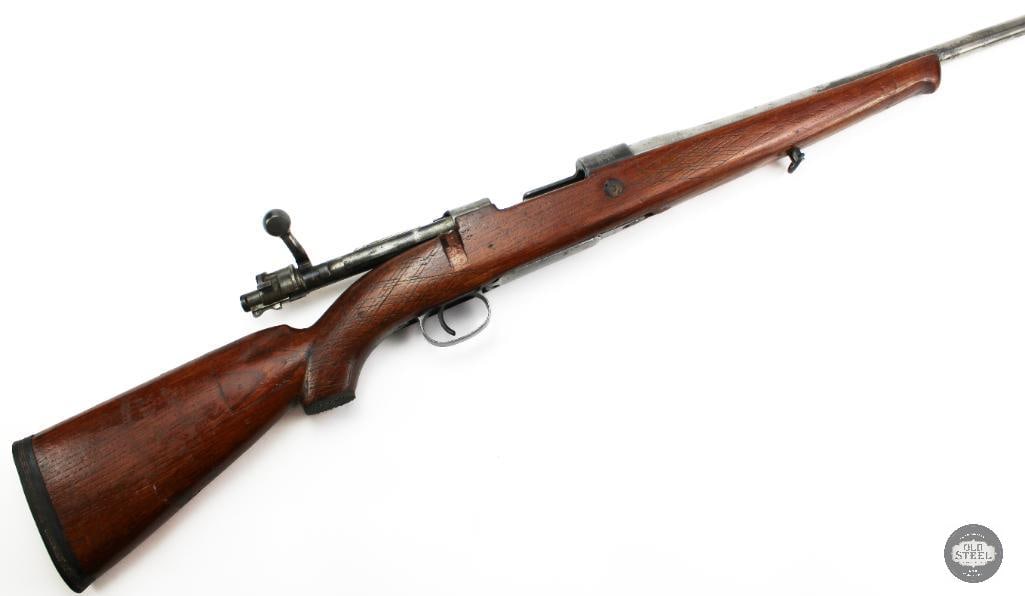 Yugoslav Mauser M98/1924 Sporter .22-250 Bolt Action Rifle: This Yugoslav Mauser M98/1924 is a bolt-action rifle originally produced as part of the well-known Mauser 98 family, widely regarded for its strength, reliability, and smooth controlled-round-feed