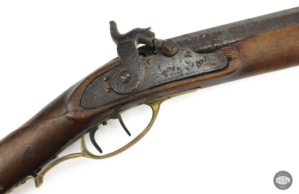 Unknown Maker .32 Cal Percussion Black Powder Rifle Octagon Barrel Double Set Triggers: This unknown maker percussion black powder rifle is chambered in approximately .32 caliber and features a 42.5-inch octagon barrel with a 13-inch length of pull. The rifle is equipped with double set