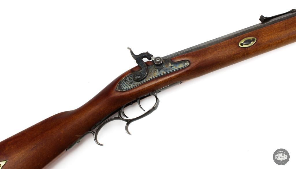 CVA .50 Cal Percussion Rifle Double Set Triggers 32" Octagon Barrel: This CVA percussion rifle is chambered in .50 caliber and features a 32-inch octagon barrel with a 13.75-inch length of pull. The rifle is equipped with double set triggers and retains its traditional