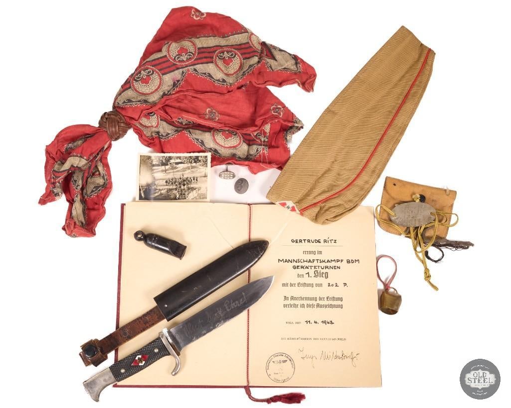 Lot of WWII German Hitler Youth Memorabilia Knife, Side Cap, Award Certificate & Accessories: This lot includes a variety of original WWII-era Hitler Youth memorabilia and accessories. Included is a Hitler Youth knife with "Blut und Ehre" ("Blood and Honor") engraving and its sheath, a Hitler