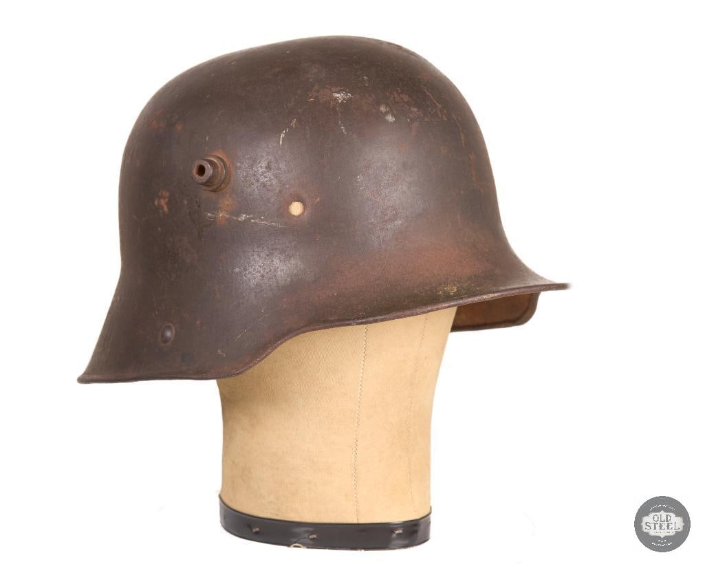 Original M18 Stahlhelm Shell WWI German Helmet Display Piece: This original M18 Stahlhelm shell is an authentic World War I German helmet shell. The suspension system is no longer present, leaving the shell only. The interior exhibits surface rust and age-relate