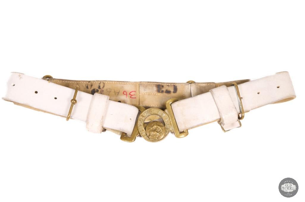 Victorian Era British Military White Belt & Buckle Boer War Period: This Victorian-era British military white belt with buckle is a Boer War period accoutrement. The belt is constructed in the traditional white military web style with an associated metal buckle. The s