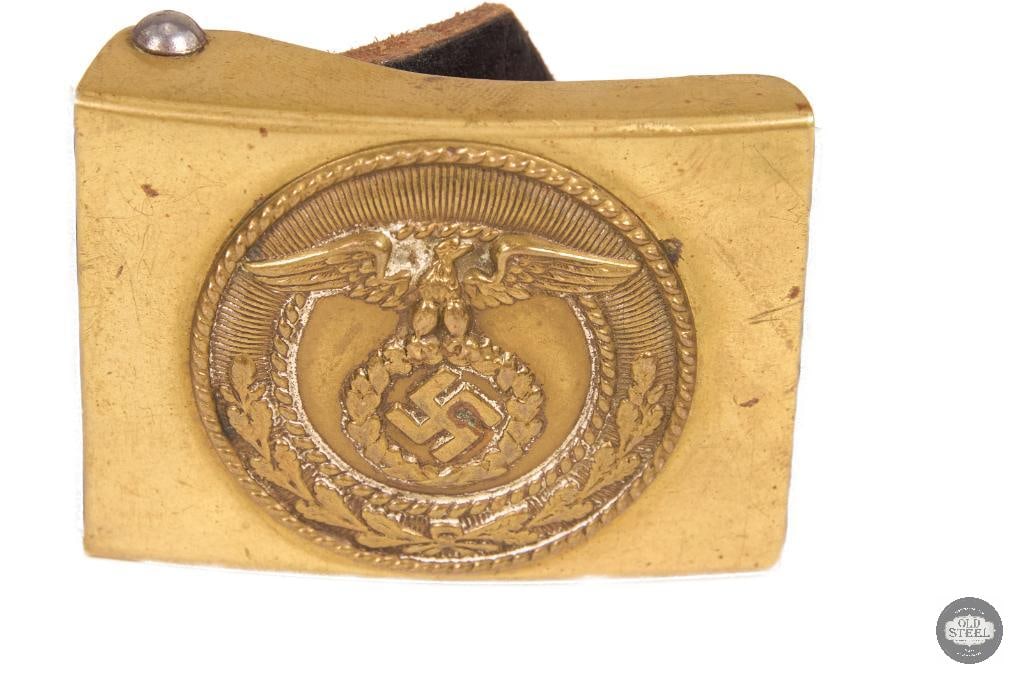 Original WWII German SA Wehrmannschaft Belt & Buckle Set: This original WWII German SA Wehrmannschaft belt and buckle set is a period field uniform component. The set includes the belt and matching buckle, both showing age-related wear consistent with use