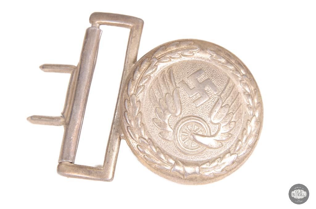 Original WWII German Reichsbahn Officer Belt Buckle Railway Service: This original WWII German Reichsbahn officer belt buckle is a period uniform component associated with German state railway service personnel. The buckle shows age-related wear consistent with period