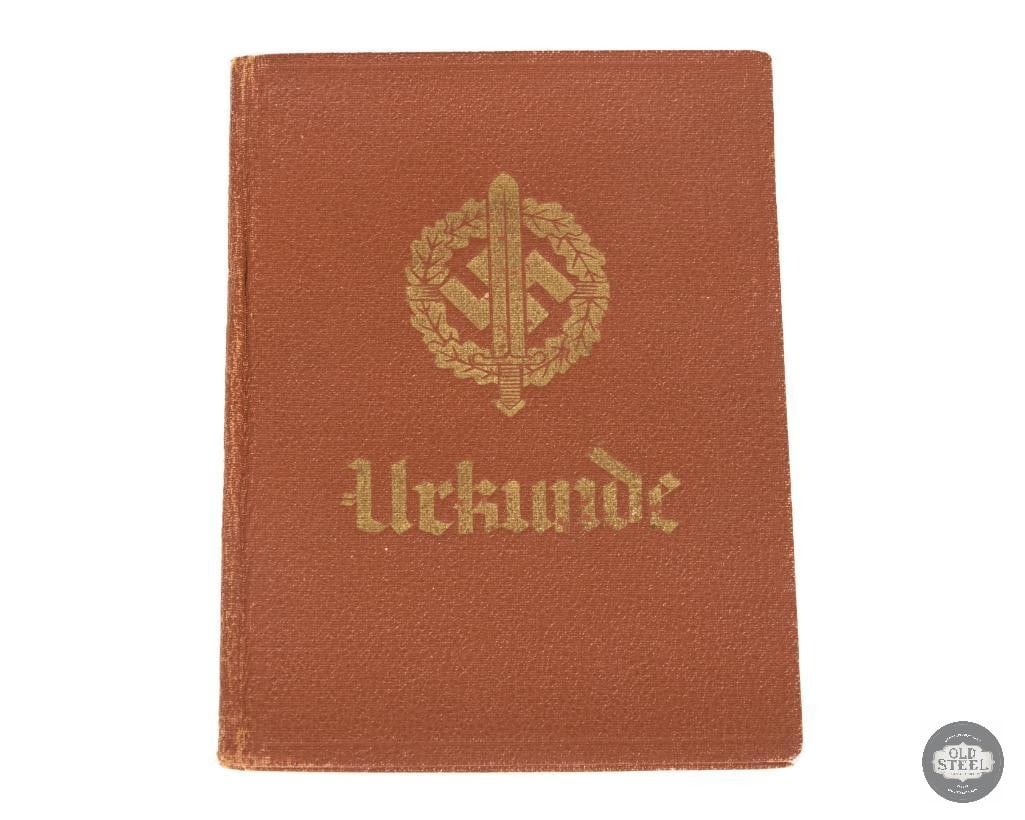 Sports Badge Certificate Booklet: This is an SA Sportabzeichen Urkunde (Sports Badge Certificate) booklet from Nazi Germany. The booklet typically contains a portrait photo of the recipient and records their sporting achievements. The