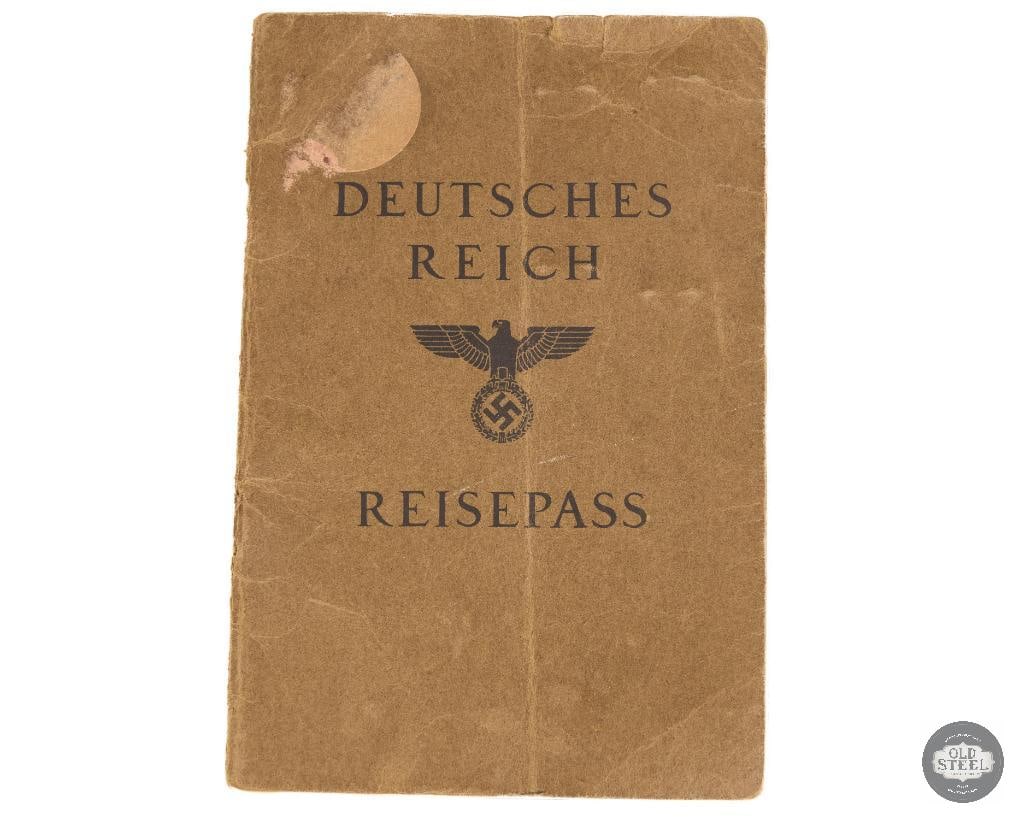 German Reich Passport: This is a vintage Deutsches Reich Reisepass (German Reich Passport) from the Nazi era, likely dating between 1933 and 1945. The cover features the state emblem of the period, an eagle perched atop a