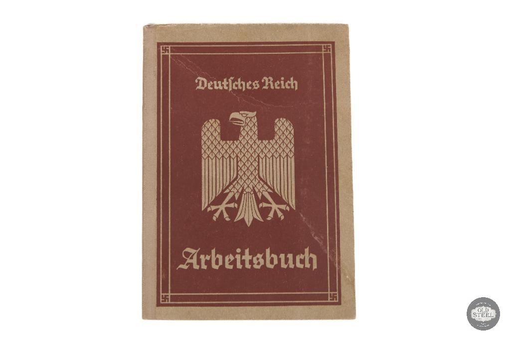 German Reich Passport: This is a vintage Deutsches Reich Reisepass (German Reich Passport) from the Nazi era, likely dating between 1933 and 1945. The cover features the state emblem of the period, an eagle perched atop a