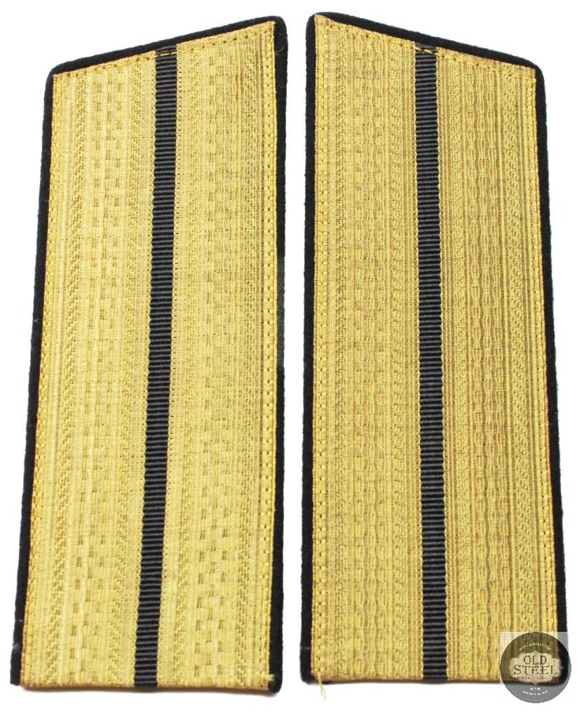 Soviet Union or Russian Navy Parade Officer Shoulder Boards: These are Soviet Union or Russian Navy parade officer shoulder boards featuring a black navy color with gold embroidery. They are often classified as M43 style boards, commonly used on parade uniforms