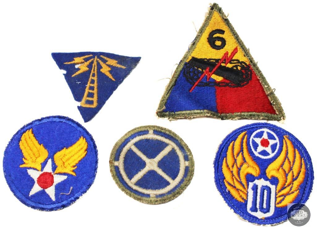 Vintage World War II United States Military Insignia Patches: Vintage World War II United States military insignia patches. The group includes insignia for the Army Air Forces and specific armored divisions. The triangular patch features a "6" and is associated 