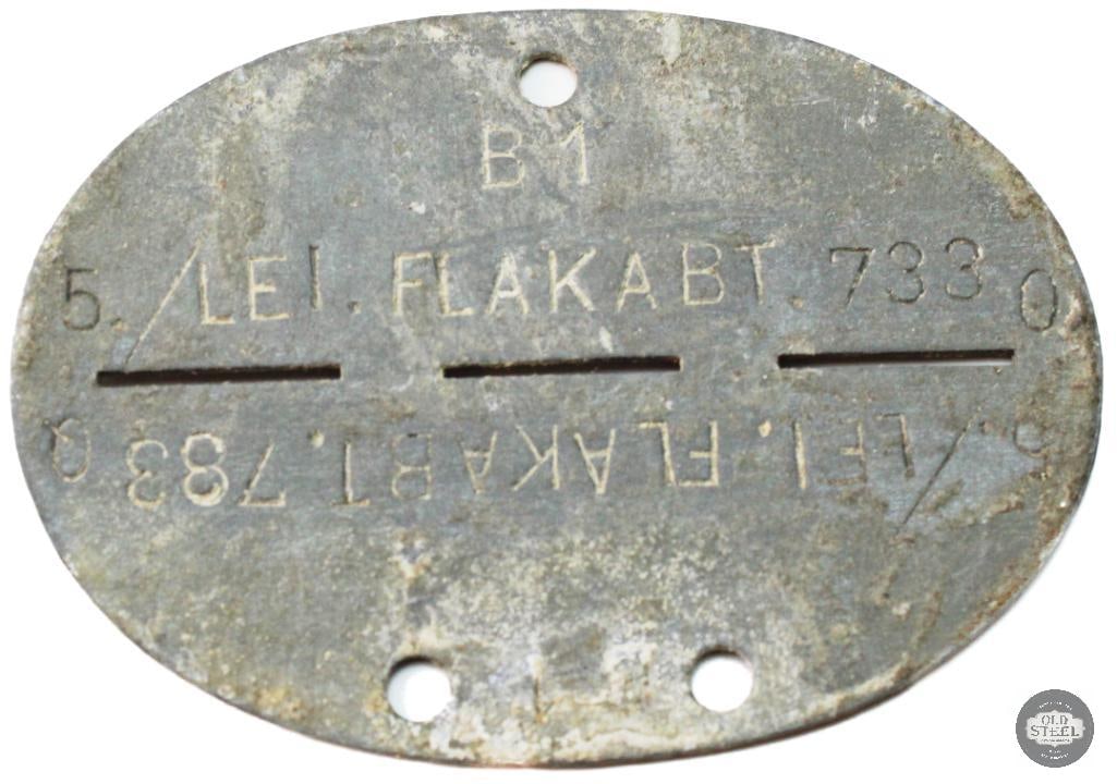 German Flak Regiment Soldier's Erkennungsmarke Dogtag WWII: German Flak Regiment Soldier's Erkennungsmarke Dogtag WWII THIS ITEM IS AS PICTURED WITH NO FURTHER ATTACHMENTS. ALL SALES ARE FINAL. PLEASE REFER TO THE AUCTION DESCRIPTION, LOT