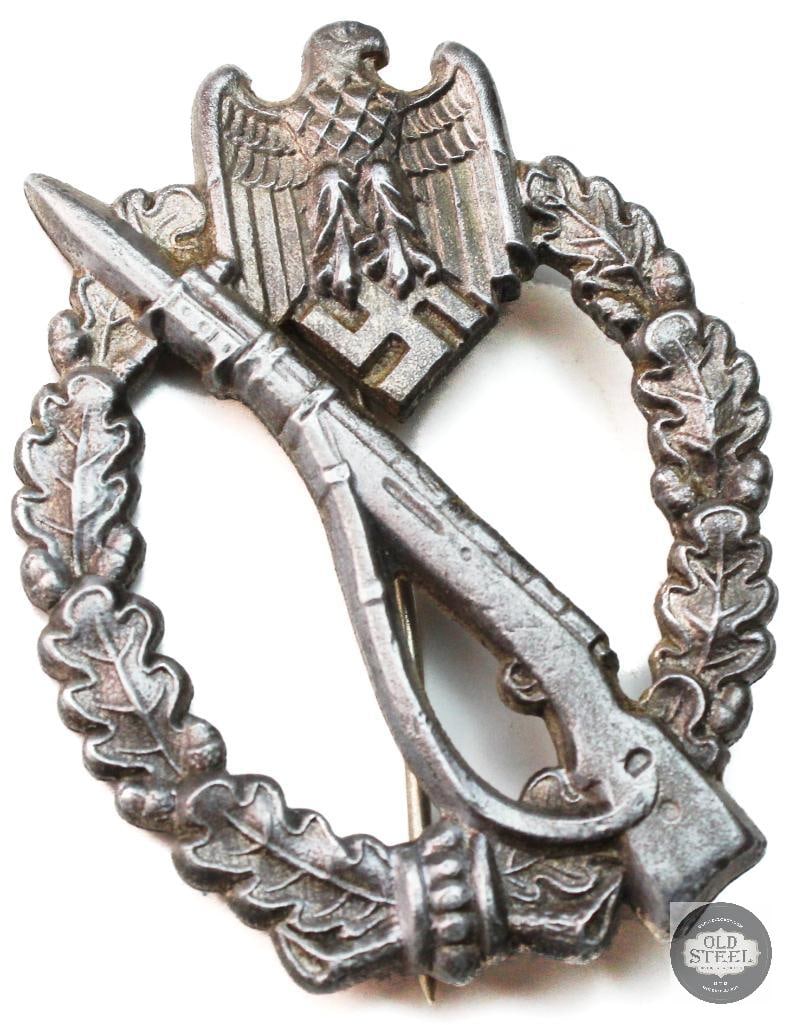 Original Heer Infantry Assault Badge Germany WWII - GWL: World War II German Infantry Assault Badge. GWL marked on the reverse. THIS ITEM IS AS PICTURED WITH NO FURTHER ATTACHMENTS. ALL SALES ARE FINAL. PLEASE REFER TO THE AUCTION DESCRIPTION, LOT