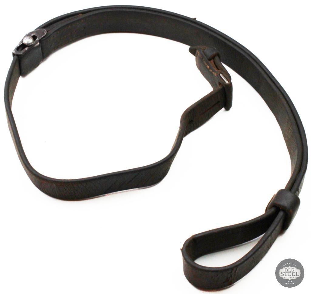 Original Mauser G33/40 Leather Rifle Sling WWII German Mountain Carbine: This original Mauser G33/40 leather rifle sling is an authentic accessory for the G33/40 mountain carbine. Constructed of leather with steel hardware, the sling shows age-related wear, handling marks,