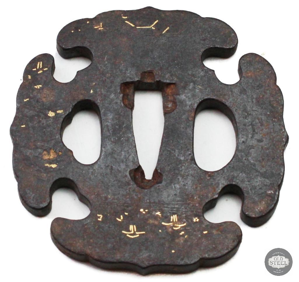 Original Japanese Iron Tsuba Sword Guard Traditional Samurai Fitting: Original Japanese iron tsuba sword guard featuring traditional construction and design. The piece is made of iron and shows age-related wear, patina, and handling marks consistent with long-term stora