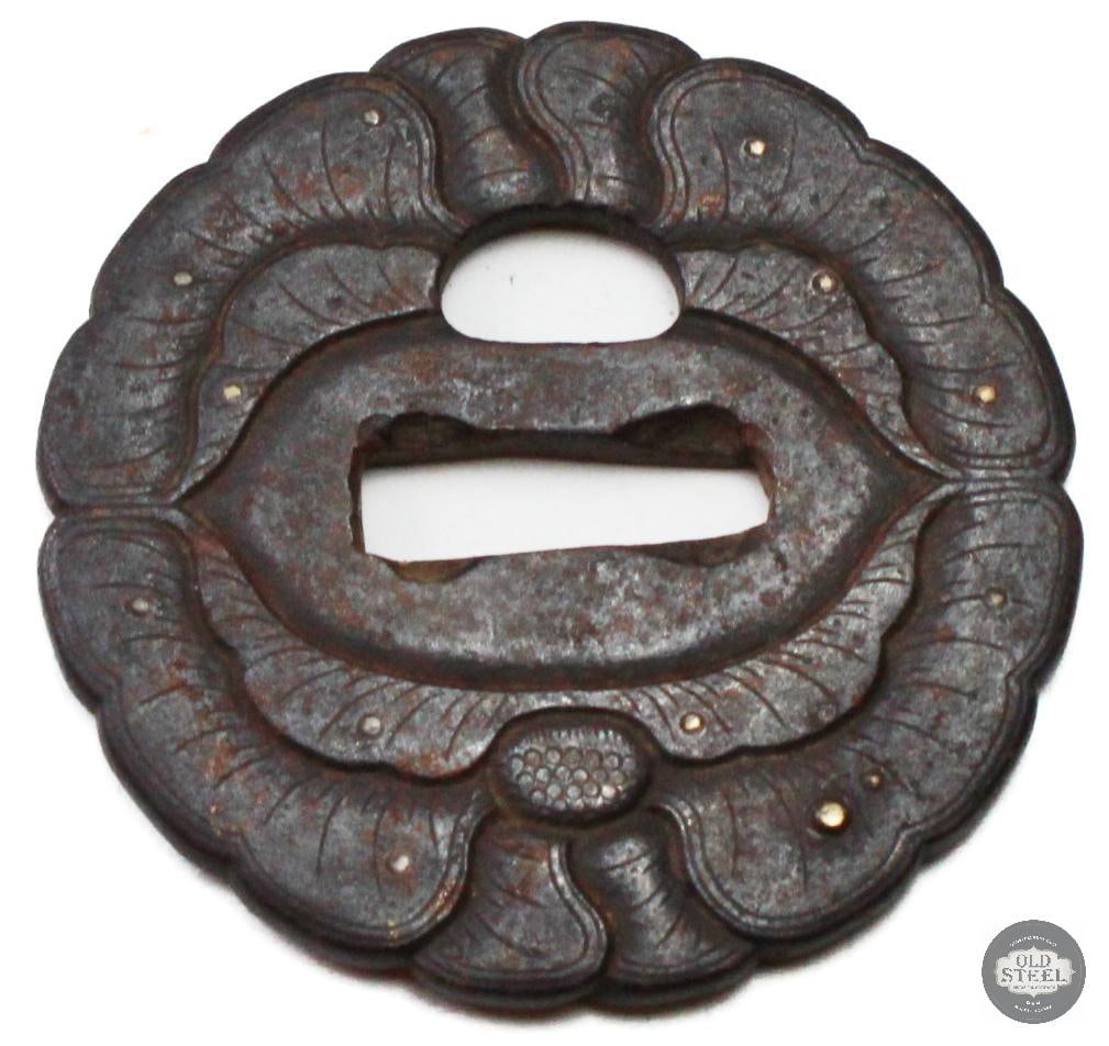 Original Japanese Iron Tsuba Leaf Motif Sword Guard: Original Japanese iron tsuba featuring a leaf-style decorative motif. The guard is constructed of iron with traditional cutout and/or relief detailing consistent with Japanese sword fittings. The