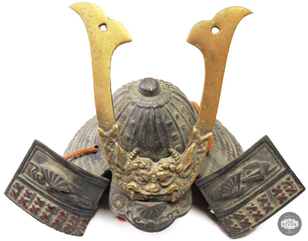 5 Miniature Samurai Helmet All Metal Kabuto Style Decorative Display:  This 5-inch tall miniature samurai helmet is an all-metal decorative display piece styled after traditional Japanese kabuto armor. The helmet features detailed construction with ornamental