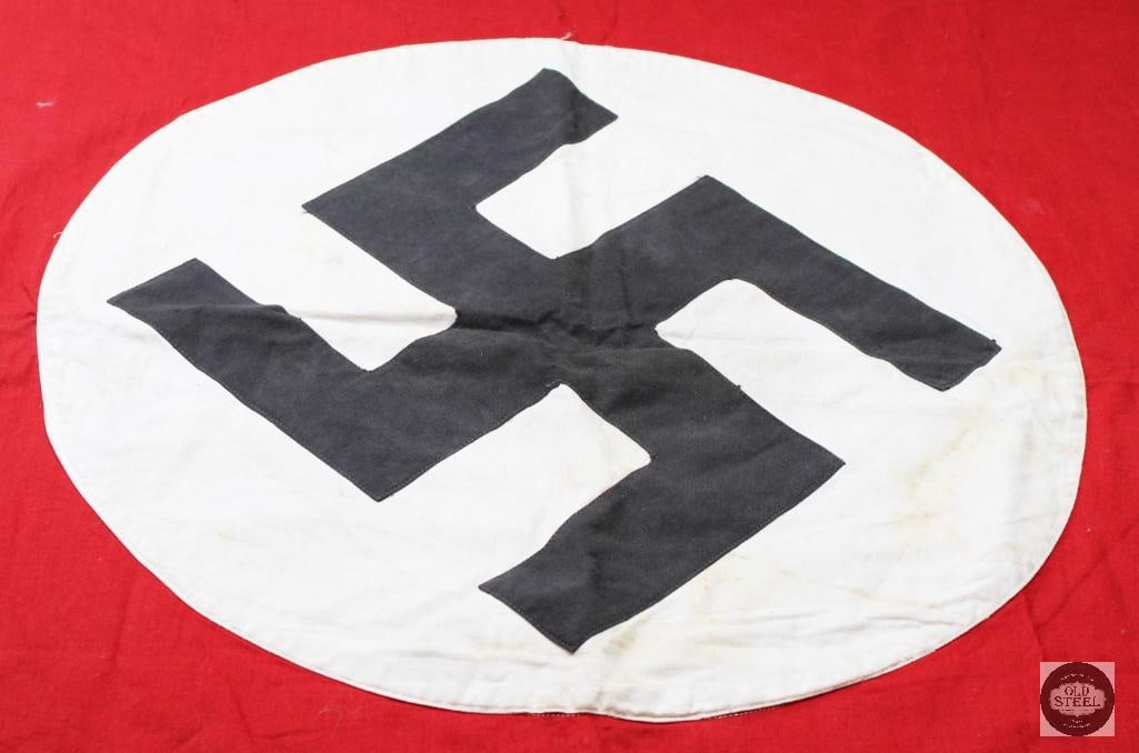 Nazi German Party Flag Aprox 40-30: Nazi German party flag from the World War II era. Overall condition of the flag appears to be good to very good for a vintage textile field find, though it shows expected signs of age and storage.The