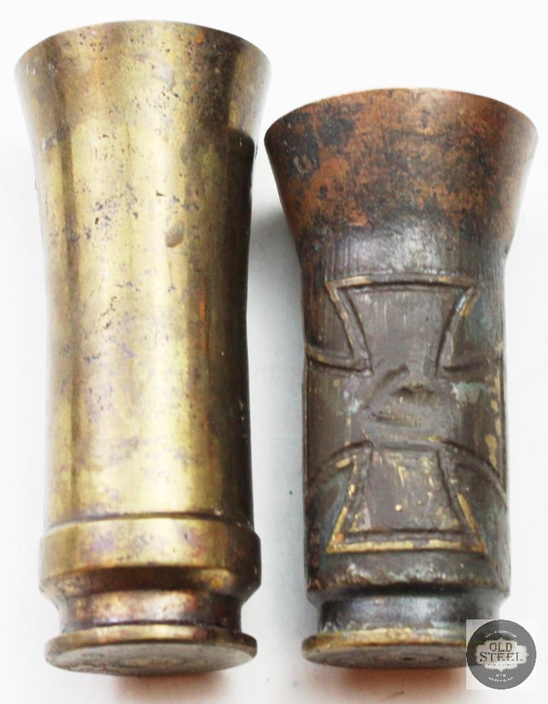 Trench Art Shot Glasses: These items are identified as World War II German "trench art" shot glasses, often fashioned from brass shell casings. The shot glass on the right features a prominent embossed Iron Cross (Eisernes Kr