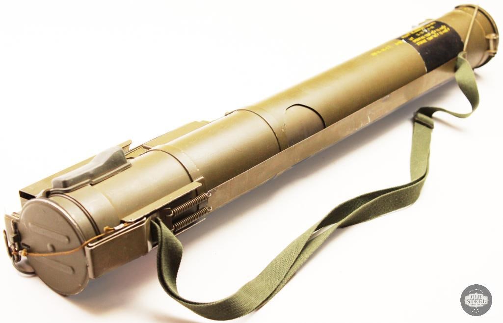 Inert M72 LAW: This item is an inert M72 LAW (Light Anti-Armor Weapon) tube, commonly utilized as a military collectible or display piece. It is a portable, one-shot, 66-mm unguided weapon originally designed to
