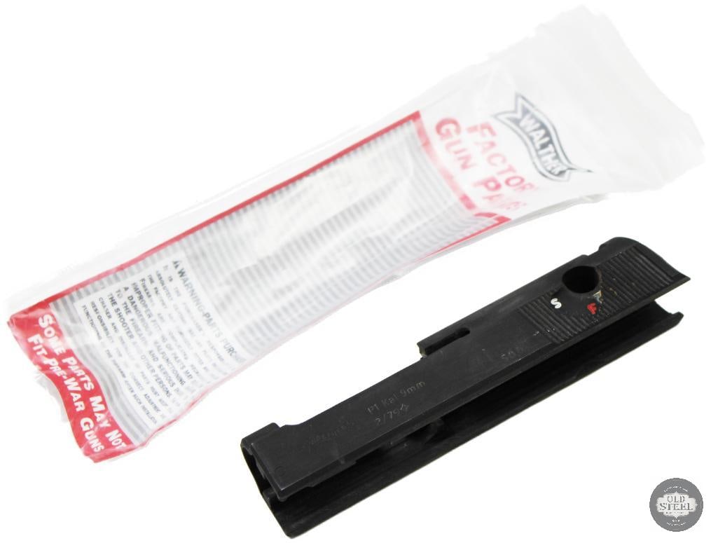 Walther P1 9mm Pistol Slide: Walther P1 9mm pistol slide, manufactured in February 1979. Includes a factory safety selector and rear sight. The slide is designed for the Walther P1 model and may not fit pre-war pistols 