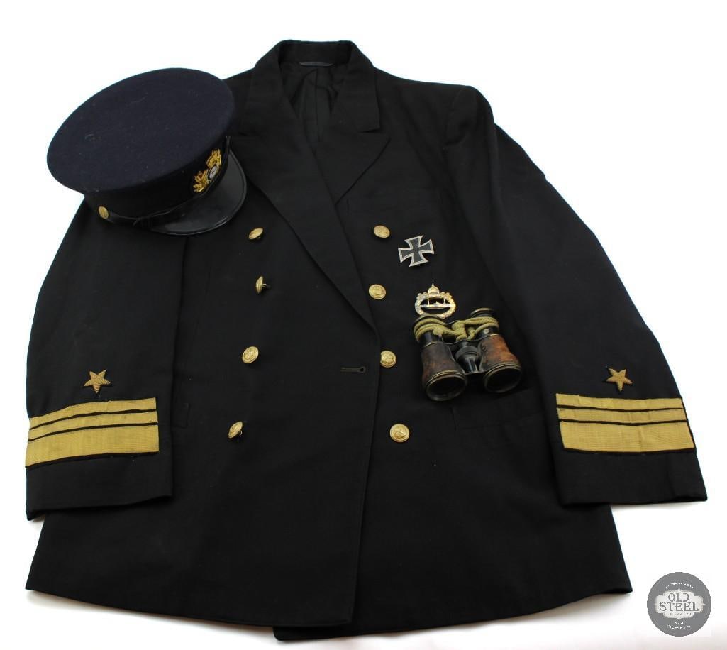 German WWI Reenactor Imperial Navy Jacket With Medals, Hat and Binoculars: Up for auction is a World War I German reenactor's kit consisting of a modern reproduction German Navy uniform jacket, matching cap, reproduction medals, and a pair of vintage binoculars. The
