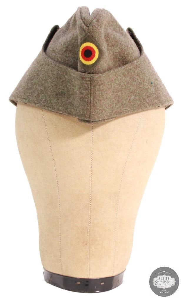 West German Bundeswehr army overseas field cap: Up for Auction a West German Bundeswehr army overseas field cap, made in 1968, featuring a distinctive wool construction and a front cockade. THIS ITEM IS AS PICTURED WITH NO FURTHER