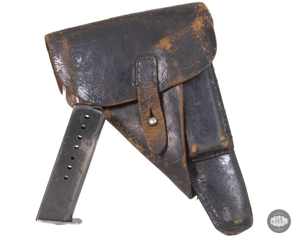 P38 Holster with p38 magazine, WWII German: WWII German P38 Holster with p38 magazine. Waffenampt marked WA145 with a makers mark that has faded to time but resembles GIN 1944. The leather is soft and supple with the stitching still mostly