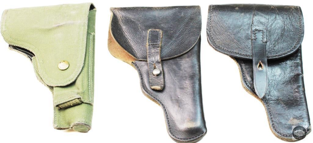 Lot of 2 Leather and 1 canvas leather lined holsters: Lot of 2 Leather and 1 canvas leather lined holsters. Appears to be for compact or subcompact PPK style or sized pistols. Exact fitment is unverified. 1 leather holster has a tear on the belt loop,