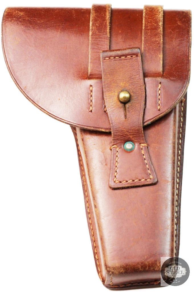 Austrian police Browning Hipower leather holster: Browning Hipower leather holster from the Austrian police. Leather has been dyed brown and has tight stitching, and brass hardware. The leather is free from tears, cracks, and checking. The holst