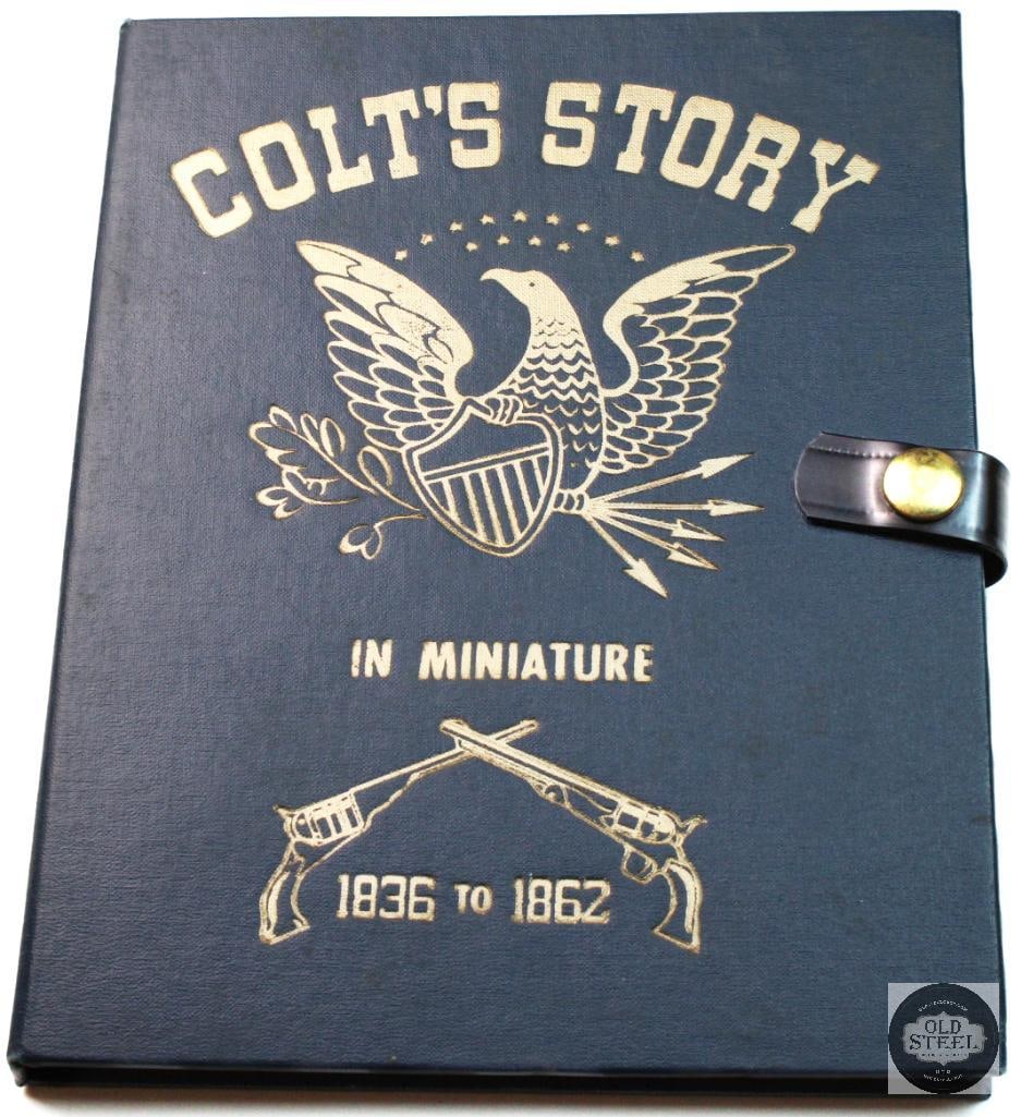 Colt's Story in Miniature 1836 to 1862: This is a vintage "Colt's Story in Miniature 1836 to 1862" collectible book set, typically produced in the 1960s or 1970s. The blue hardback album features gold lettering, a stamped eagle emblem, and