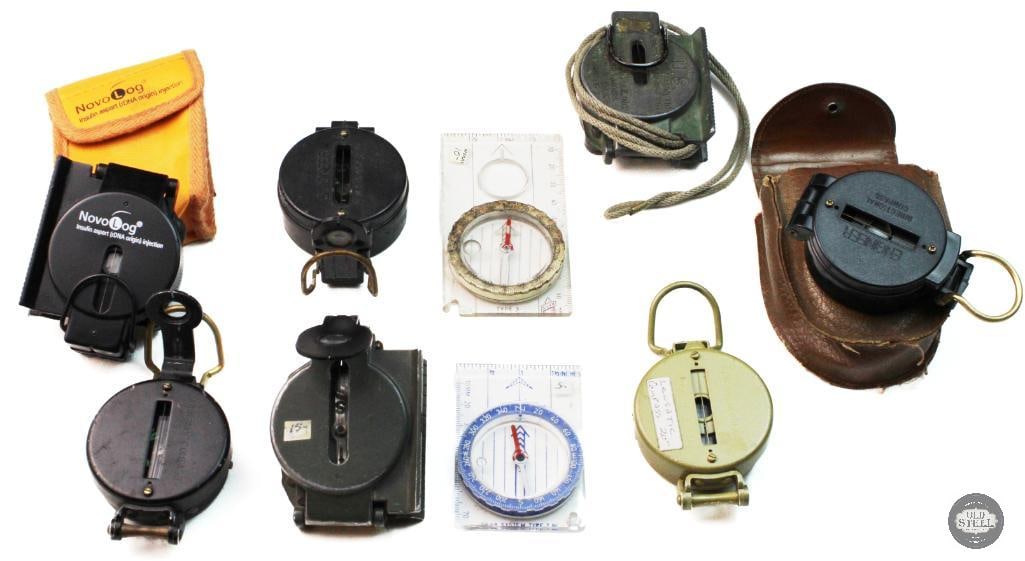 Assorted Compass Collection: This collection features several vintage U.S. Army Corps of Engineers lensatic compasses, likely dating from World War II . Some models were manufactured by Superior Magneto Corp or W. &