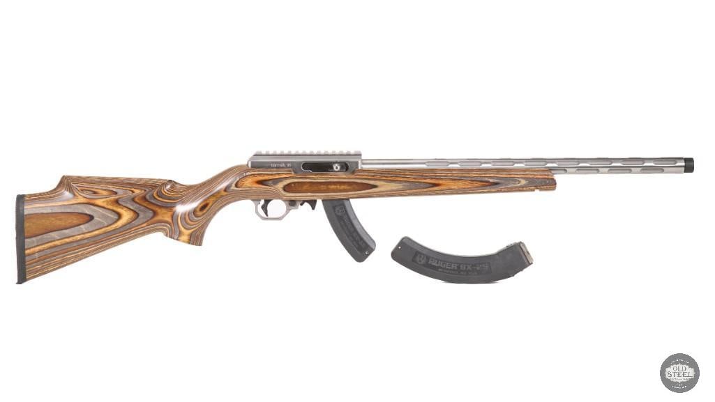 Volquartsen Custom SS 10/22 .22 LR 18.5" Fluted Barrel w/ Laminate Stock & Threaded Muzzle: Offered in this lot is a premium Volquartsen Custom SS 10/22 chambered in .22 LR, a high-performance semi-automatic rimfire rifle built around the legendary Ruger 10/22 platform. Volquartsen is