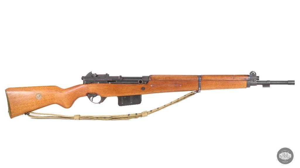 Egyptian Contract FN-49 Rifle 8mm Mauser w/ Farsi Markings & Canvas Sling: Up for auction is a desirable Egyptian contract Fabrique Nationale FN-49 semi-automatic rifle chambered in 857mm Mauser, featuring distinctive Farsi markings and strong collector appeal. Produced by