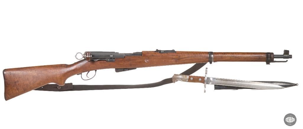 Swiss K11 Carbine 7.5x55mm with Bayonet and 1924 Sling: Offered is a desirable Swiss K11 Carbine chambered in 7.5x55mm Swiss, accompanied by a bayonet and original sling, representing an excellent opportunity for collectors of Swiss military firearms. The 