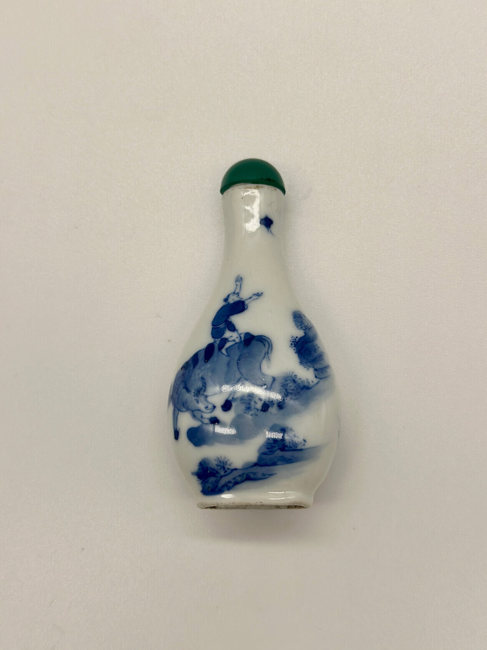 18th Century Blue and White Snuff Bottle with a Boy Riding a Bull: W3.8 H7.7cm Condition: Good, Normal wear of useFor further details, including additional photos or videos for this lot, please reach out to oceanofantique@gmail.com. Any condition statement provided i